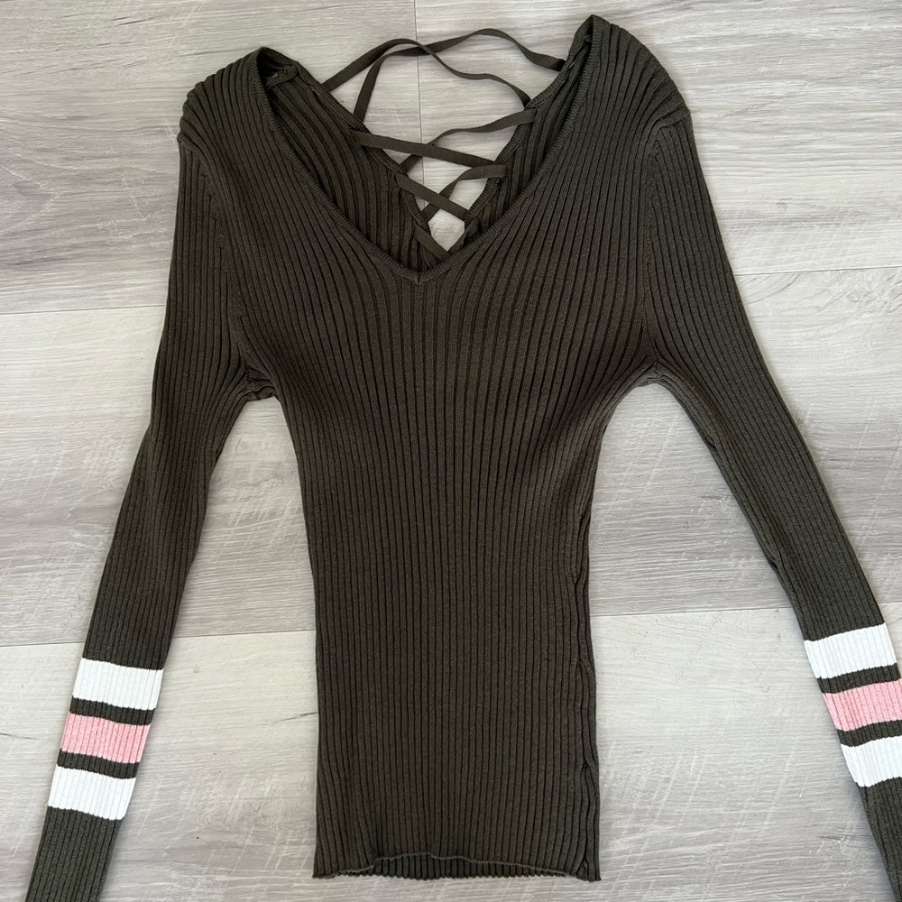 long sleeve top with design back. size S